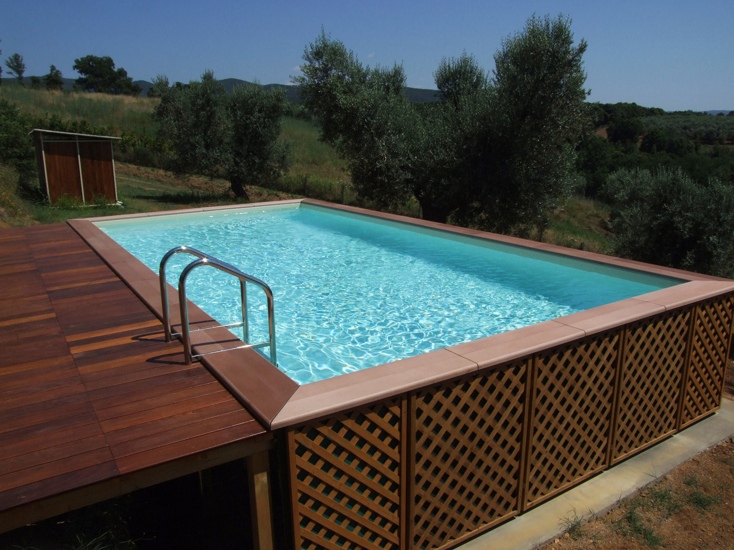 Aufstellpool kaufen 3x5 mit Holz und Stein